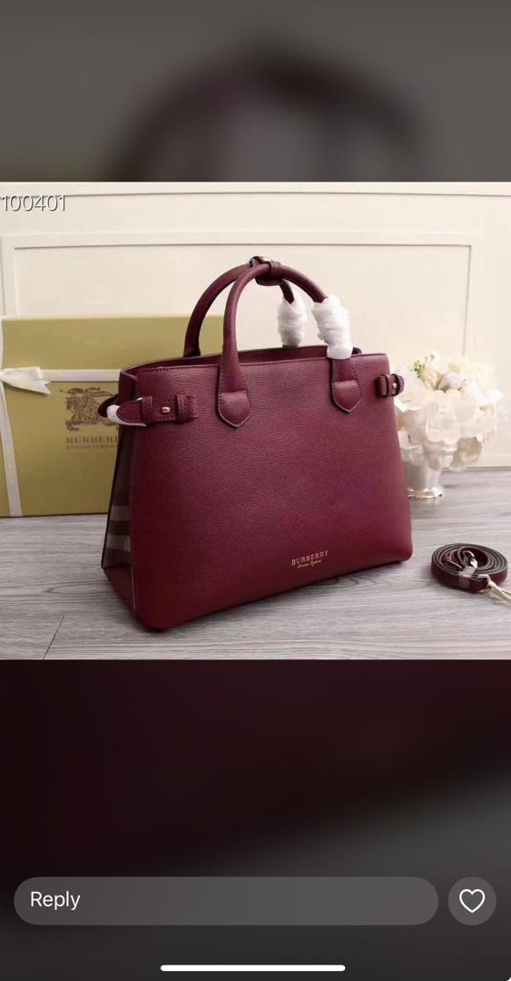 Versace bag,  comes in various colours. Red. Gold. Black. Silver